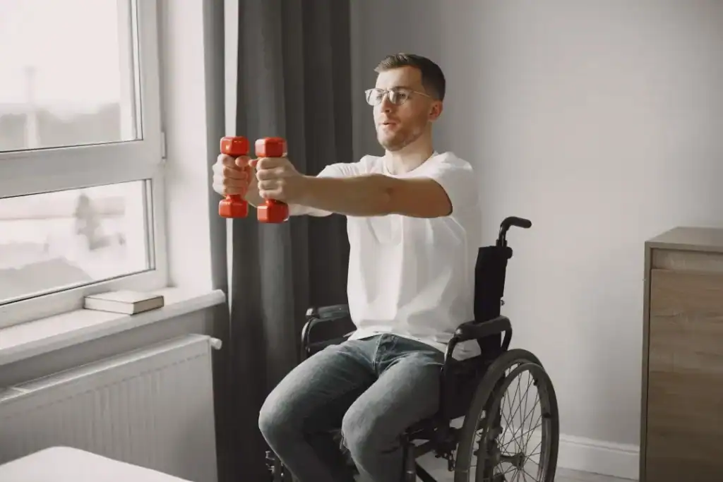 Empowering Weight Loss: A Comprehensive Guide for Individuals with Disabilities 1 Image of man doing exercise in his wheelchair to aid weight loss Brackley