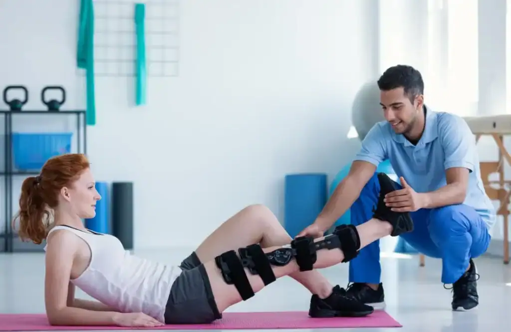 Debunking Meal Timing Myths: The Truth About Muscle Recovery 1 Woman having treatment to help muscle recovery Brackley after an injury